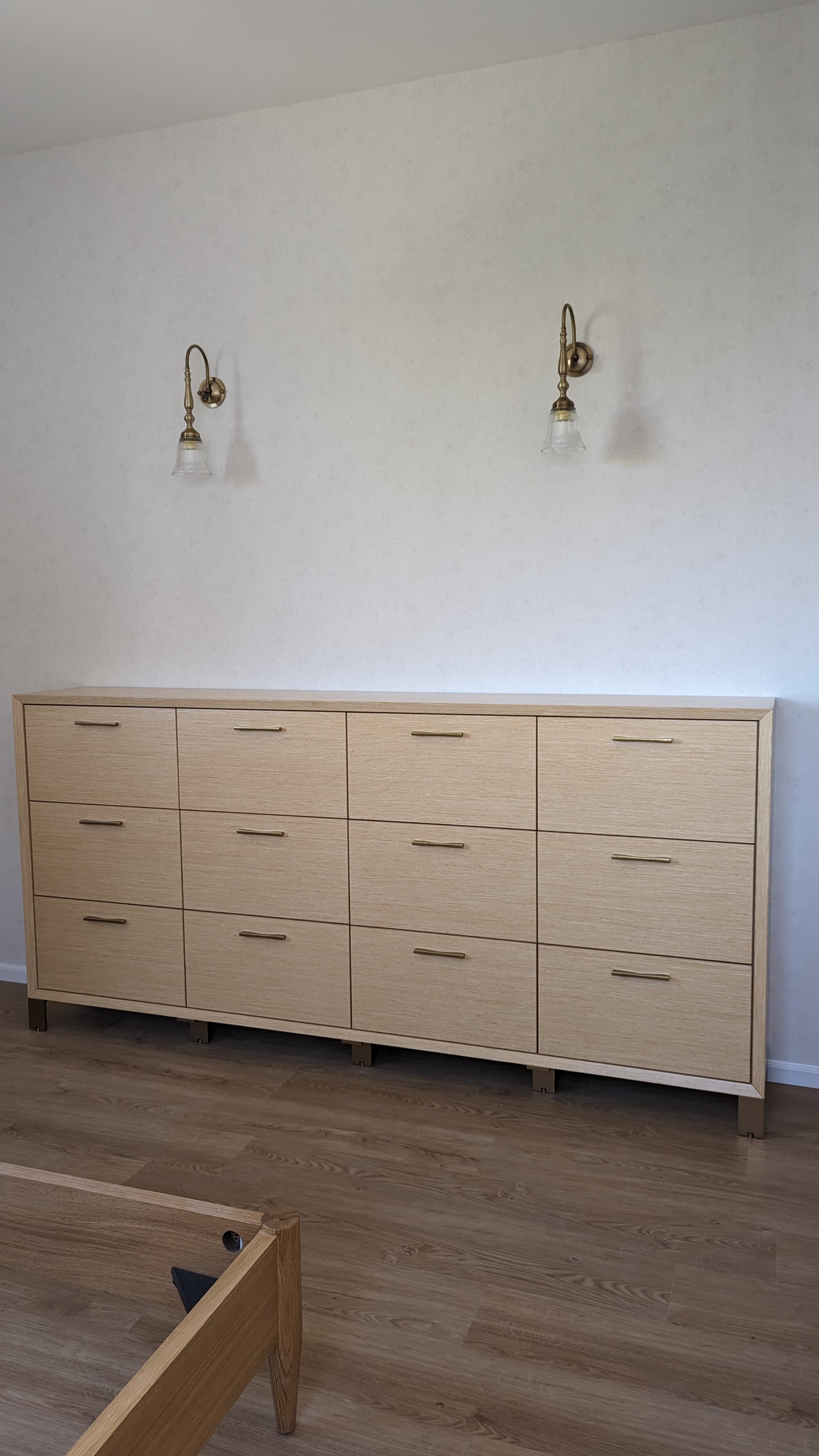 bedroom wood dresser brass wall sconces