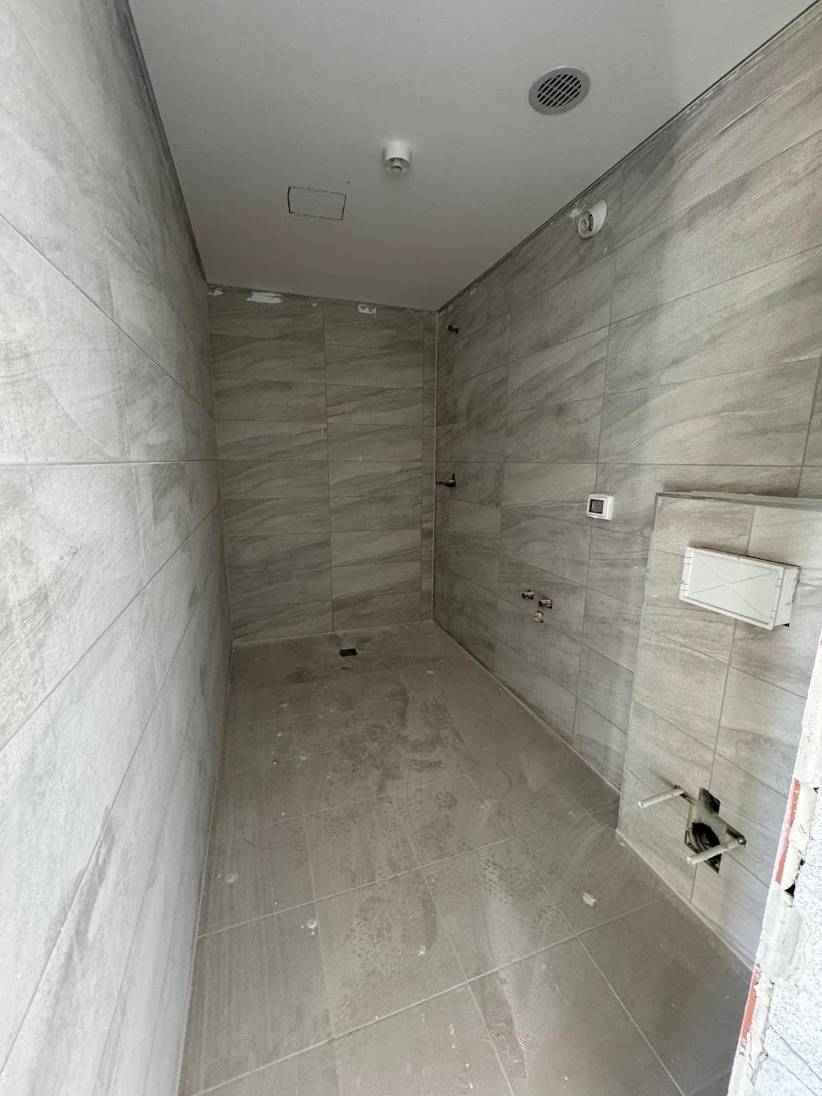 master bathroom shower wood tiles construction